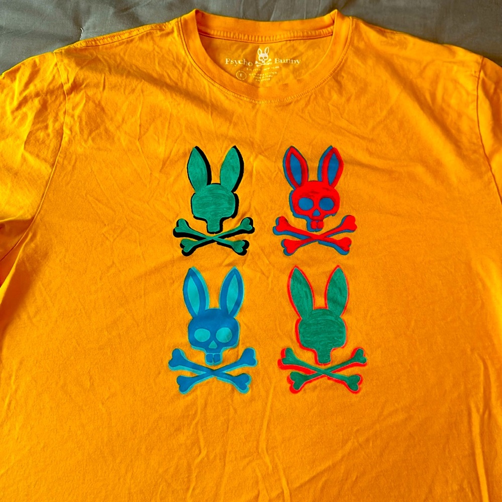 Psycho bunny size 8/XL golden Tshirt logo front